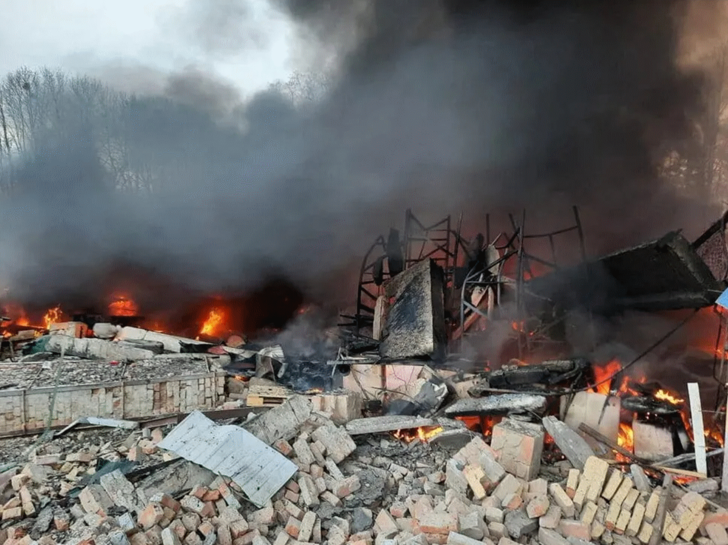A Ukrainian building flattened by a Russian missile. Retrieved from unknown, but likely the BBC.